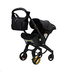 Картинка Детское автокресло Simple Parenting Doona (midnight edition)